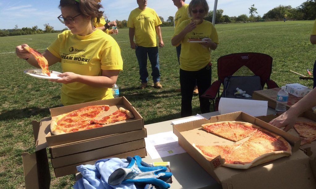 Stantec volunteers getting pizza at Mary Cummings Park